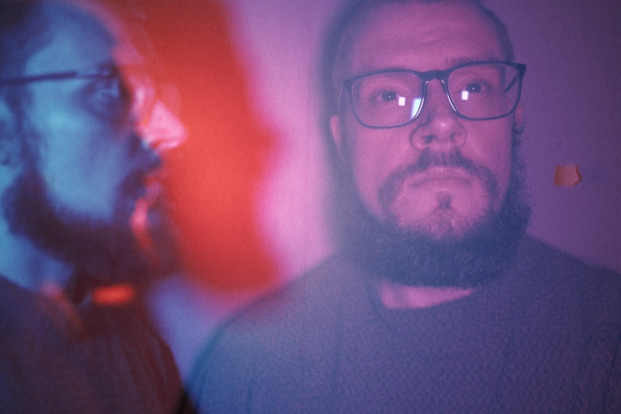 Color double exposure portrait of Serhii Diedushev